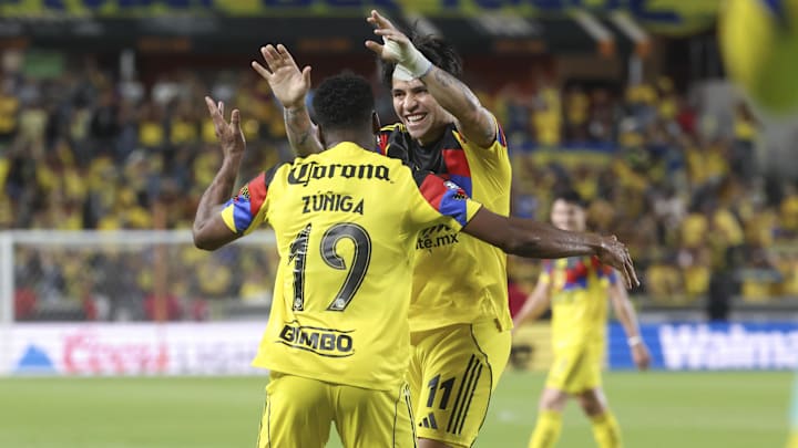 Aug 2, 2025; Houston, TX, USA; Club America forward Jose Zuniga (19) celebrates with Victor Davila after scoring a goal against Minnesota United during the second half at Shell Energy Stadium. Mandatory Credit: Troy Taormina-Imagn Images