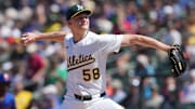 Apr 13, 2025; West Sacramento, California, USA; Athletics pitcher Noah Murdock (58) throws a pitch against the New York Mets during the seventh inning at Sutter Health Park. Mandatory Credit: Darren Yamashita-Imagn Images