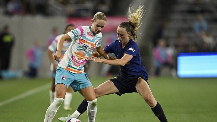 San Diego Wave FC defender Hanna Lundkvist (6) dribbles against Utah Royals FC defender Olivia Smith Griffits (3) during the second half at Snapdragon Stadium