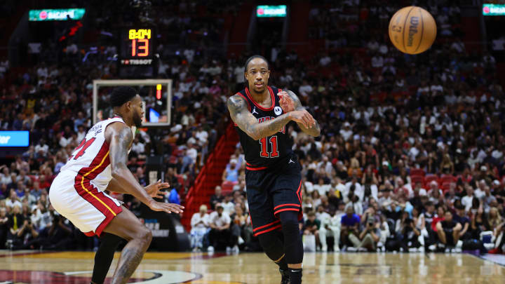 Apr 19, 2024; Miami, Florida, USA; Chicago Bulls forward DeMar DeRozan (11) passes the basketball against the Miami Heat: Sam Navarro-USA TODAY Sports