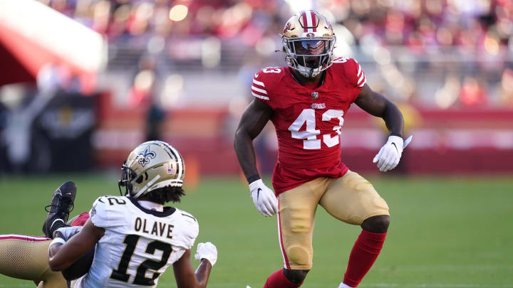 Aug 18, 2024; Santa Clara, California, USA; San Francisco 49ers safety Malik Mustapha (43) regains his footing after tackling New Orleans Saints wide receiver Chris Olave (12) in the first quarter at Levi's Stadium. Mandatory Credit: Cary Edmondson-USA TODAY Sports