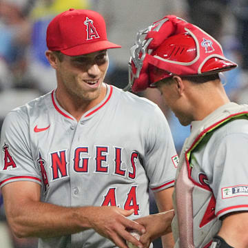 Aug 20, 2024; Kansas City, Missouri, USA; Los Angeles Angels pitcher Ben Joyce (44) celebrates with catcher Logan O'Hoppe (14) after the win over the Kansas City Royals at Kauffman Stadium.