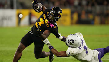Sep 26, 2025; Tempe, Arizona, USA; Arizona State Sun Devils running back Raleek Brown (3) is tackled by TCU Horned Frogs safety Austin Jordan (1) in the second half at Mountain America Stadium, Home of the ASU Sun Devils. Mandatory Credit: Jacob Reiner-Imagn Images
