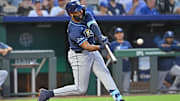 Tampa Bay Rays third baseman Junior Caminero doubles in the eighth inning against the Kansas City Royals at Kauffman Stadium.