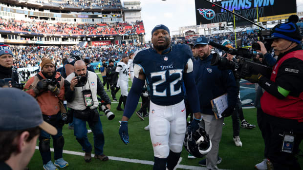 Tennessee Titans running back Derrick Henry (22) heads off the field after possibly his last game as a Titans player 