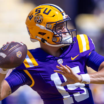 Sep 21, 2024; Baton Rouge, Louisiana, USA;  LSU Tigers quarterback AJ Swann (15) during warmups before a game against the UCLA Bruins at Tiger Stadium. Mandatory Credit: Stephen Lew-Imagn Images