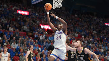 Kansas Jayhawks center Paul Mbiya (34) looks for the basket during the second half of the exhibition game against Fort Hays State Tigers inside Allen Fieldhouse on Tuesday, October, 28, 2025.