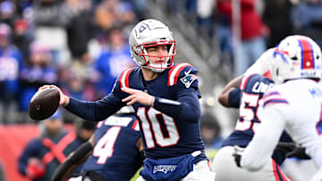 Jan 5, 2025; Foxborough, Massachusetts, USA; New England Patriots quarterback Drake Maye (10) looks to throw against the Buffalo Bills during the first half at Gillette Stadium. Mandatory Credit: Brian Fluharty-Imagn Images