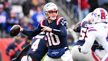 Jan 5, 2025; Foxborough, Massachusetts, USA; New England Patriots quarterback Drake Maye (10) looks to throw against the Buffalo Bills during the first half at Gillette Stadium. Mandatory Credit: Brian Fluharty-Imagn Images