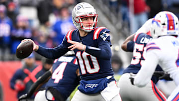Jan 5, 2025; Foxborough, Massachusetts, USA; New England Patriots quarterback Drake Maye (10) looks to throw against the Buffalo Bills during the first half at Gillette Stadium. Mandatory Credit: Brian Fluharty-Imagn Images