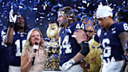 Dec 31, 2024; Glendale, AZ, USA; Penn State Nittany Lions tight end Tyler Warren (44) reacts after being named the offensive MVP for the game against the Boise State Broncos in the Fiesta Bowl at State Farm Stadium. Mandatory Credit: Mark J. Rebilas-Imagn Images