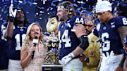 Dec 31, 2024; Glendale, AZ, USA; Penn State Nittany Lions tight end Tyler Warren (44) reacts after being named the offensive MVP for the game against the Boise State Broncos in the Fiesta Bowl at State Farm Stadium. Mandatory Credit: Mark J. Rebilas-Imagn Images
