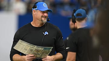 Nov 24, 2024; Indianapolis, Indiana, USA; Detroit Lions head football coach Dan Campbell smiles on the sidelines before the game against the Indianapolis Colts  at Lucas Oil Stadium. Mandatory Credit: Marc Lebryk-Imagn Images