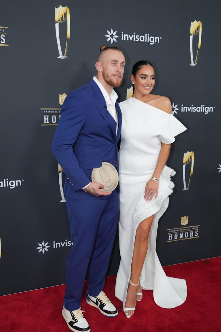 George Kittle and Claire Kittle on the red carpet before Super Bowl LIX NFL Honors at Saenger Theatre.  