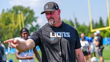 Detroit Lions head coach Dan Campbell talks to staff at the end of the joint practice with the Miami Dolphins at the Lions headquarters and training facility in Allen Park, Thursday, Aug. 14 2025