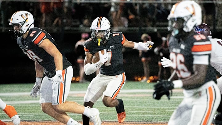 West Des Moines Valley's Jayden McGregory runs the ball during the West Des Moines Valley and Waterloo West football game at Valley Stadium on Friday, Oct. 11, 2024, in West Des Moines.