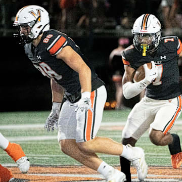 West Des Moines Valley's Jayden McGregory runs the ball during the West Des Moines Valley and Waterloo West football game at Valley Stadium on Friday, Oct. 11, 2024, in West Des Moines.