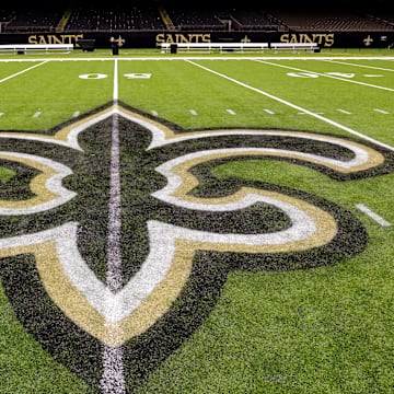 Oct 30, 2022; New Orleans, Louisiana, USA;  General view of the New Orleans Saints logo as the midfield logo fleur-de-lis after the game between the New Orleans Saints and the Las Vegas Raiders at Caesars Superdome. Mandatory Credit: Stephen Lew-Imagn Images