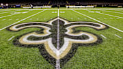 Oct 30, 2022; New Orleans, Louisiana, USA;  General view of the New Orleans Saints logo as the midfield logo fleur-de-lis after the game between the New Orleans Saints and the Las Vegas Raiders at Caesars Superdome. Mandatory Credit: Stephen Lew-Imagn Images