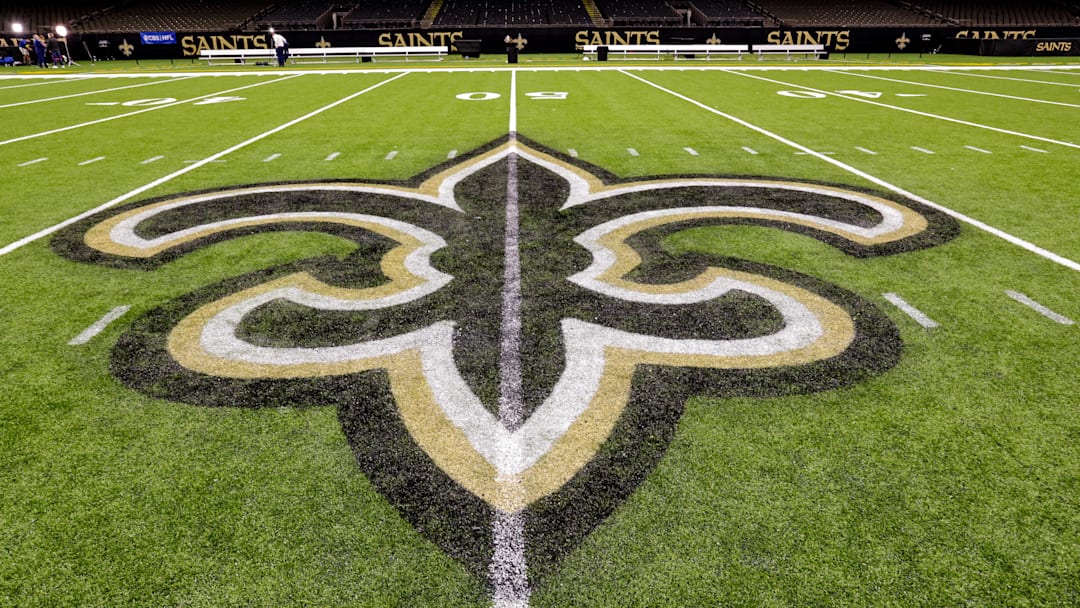 Oct 30, 2022; New Orleans, Louisiana, USA;  General view of the New Orleans Saints logo as the midfield logo fleur-de-lis after the game between the New Orleans Saints and the Las Vegas Raiders at Caesars Superdome. Mandatory Credit: Stephen Lew-Imagn Images