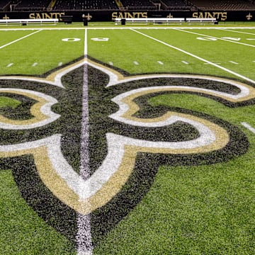 Oct 30, 2022; New Orleans, Louisiana, USA;  General view of the New Orleans Saints logo as the midfield logo fleur-de-lis after the game between the New Orleans Saints and the Las Vegas Raiders at Caesars Superdome. Mandatory Credit: Stephen Lew-Imagn Images