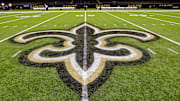Oct 30, 2022; New Orleans, Louisiana, USA;  General view of the New Orleans Saints logo as the midfield logo fleur-de-lis after the game between the New Orleans Saints and the Las Vegas Raiders at Caesars Superdome. Mandatory Credit: Stephen Lew-Imagn Images