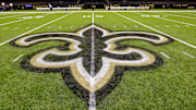 Oct 30, 2022; New Orleans, Louisiana, USA;  General view of the New Orleans Saints logo as the midfield logo fleur-de-lis after the game between the New Orleans Saints and the Las Vegas Raiders at Caesars Superdome. Mandatory Credit: Stephen Lew-Imagn Images