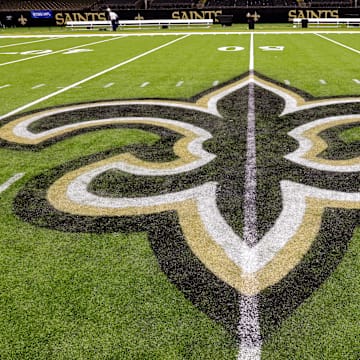 Oct 30, 2022; New Orleans, Louisiana, USA;  General view of the New Orleans Saints logo as the midfield logo fleur-de-lis after the game between the New Orleans Saints and the Las Vegas Raiders at Caesars Superdome. Mandatory Credit: Stephen Lew-Imagn Images