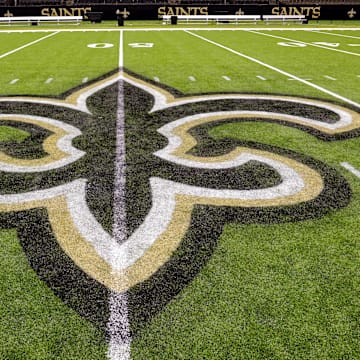 Oct 30, 2022; New Orleans, Louisiana, USA;  General view of the New Orleans Saints logo as the midfield logo fleur-de-lis after the game between the New Orleans Saints and the Las Vegas Raiders at Caesars Superdome. Mandatory Credit: Stephen Lew-Imagn Images