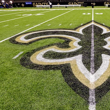 Oct 30, 2022; New Orleans, Louisiana, USA;  General view of the New Orleans Saints logo as the midfield logo fleur-de-lis after the game between the New Orleans Saints and the Las Vegas Raiders at Caesars Superdome. Mandatory Credit: Stephen Lew-Imagn Images
