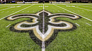 Oct 30, 2022; New Orleans, Louisiana, USA;  General view of the New Orleans Saints logo as the midfield logo fleur-de-lis after the game between the New Orleans Saints and the Las Vegas Raiders at Caesars Superdome. Mandatory Credit: Stephen Lew-Imagn Images