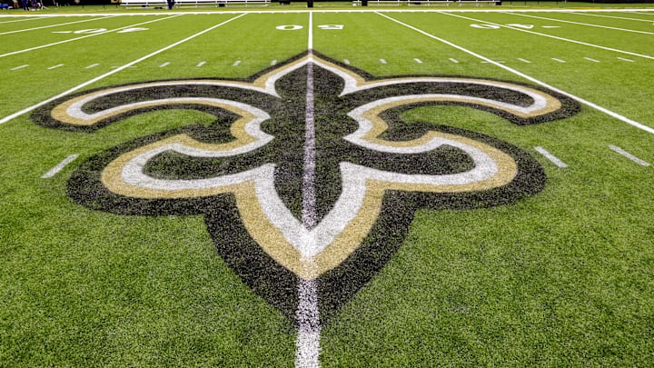 Oct 30, 2022; New Orleans, Louisiana, USA;  General view of the New Orleans Saints logo as the midfield logo fleur-de-lis after the game between the New Orleans Saints and the Las Vegas Raiders at Caesars Superdome. Mandatory Credit: Stephen Lew-Imagn Images
