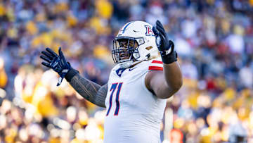 Nov 25, 2023; Tempe, Arizona, USA; Arizona Wildcats offensive lineman Jonah Savaiinaea (71) against the Arizona State Sun Devils during the Territorial Cup at Mountain America Stadium.