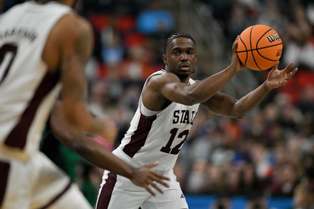 Mississippi State guard Josh Hubbard passes the ball.