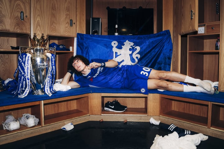 David Luiz of Chelsea poses with the Premier League Trophy