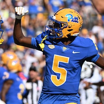 Sep 14, 2024; Pittsburgh, Pennsylvania, USA; Pittsburgh Panthers running back Desmond Reid celebrates with Raphael Williams Jr. (5) after a touchdown against the West Virginia Mountaineers during the second quarter at Acrisure Stadium. Mandatory Credit: Barry Reeger-Image Images