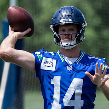 Jun 11, 2025; Renton, WA, USA; Seattle Seahawks quarterback Sam Darnold (14) passes the ball during mini-camp at Virginia Mason Athletic Center.