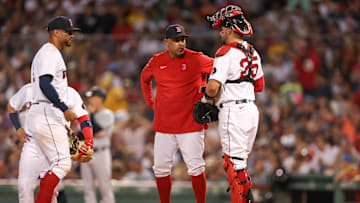 Jul 9, 2022; Boston, Massachusetts, USA; Boston Red Sox manager Alex Cora (13) visits the mound during the sixth inning against the New York Yankees at Fenway Park. Mandatory Credit: Paul Rutherford-Imagn Images