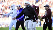 Mississippi State Bulldogs head coach Jeff Lebby  reacts after a touchdown against the Mississippi Rebels at Vaught-Hemingway Stadium.