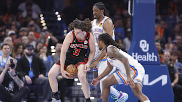 Mar 31, 2025; Oklahoma City, Oklahoma, USA; Chicago Bulls guard Josh Giddey (3) works to control the ball
