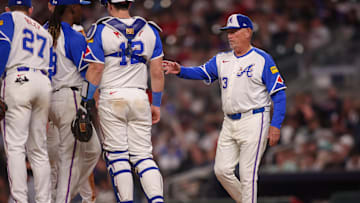 Apr 19, 2025; Atlanta, Georgia, USA; Atlanta Braves manager Brian Snitker (43) makes a pitching change against the Minnesota Twins in the sixth inning at Truist Park. Mandatory Credit: Brett Davis-Imagn Images

