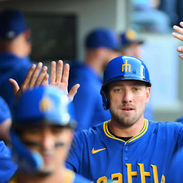 Seattle Mariners first baseman Luke Raley (20) celebrates after scoring a run against the New York Mets during the sixth inning at T-Mobile Park on Aug 11.