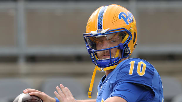 Pittsburgh Panthers quarterback Eli Holstein (10) warms up before the game against the Louisville Cardinals