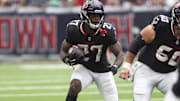 Sep 28, 2025; Houston, Texas, USA; Houston Texans running back Woody Marks (27) runs with the ball during the fourth quarter against the Tennessee Titans at NRG Stadium.