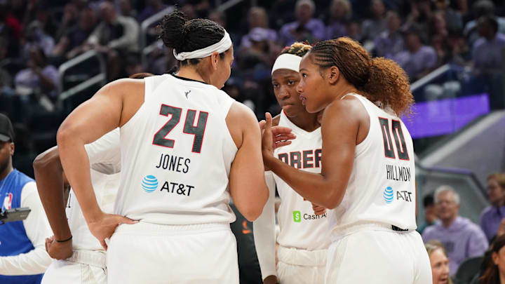 Aug 17, 2025; San Francisco, California, USA;  Atlanta Dream forward Brionna Jones (24), forward Naz Hillmon (00) and the team huddle in the first quarter against the Golden State Valkyries at Chase Center. Mandatory Credit: David Gonzales-Imagn Images