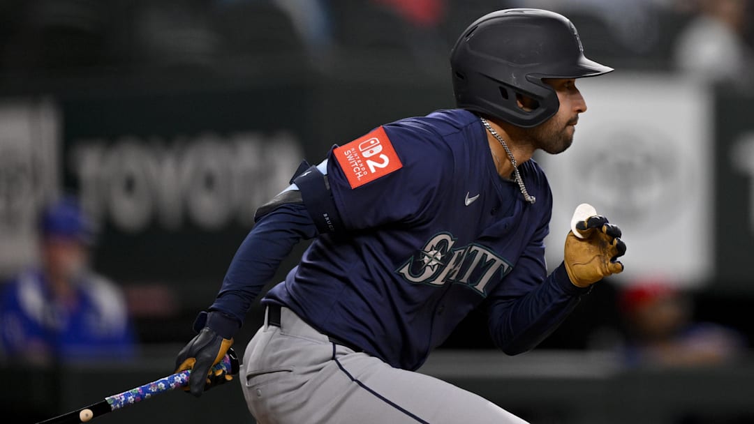 May 2, 2025; Arlington, Texas, USA; Seattle Mariners right fielder Rhylan Thomas (31) bats against the Texas Rangers during the seventh inning at Globe Life Field. Mandatory Credit: Jerome Miron-Imagn Images