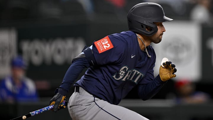 May 2, 2025; Arlington, Texas, USA; Seattle Mariners right fielder Rhylan Thomas (31) bats against the Texas Rangers during the seventh inning at Globe Life Field. Mandatory Credit: Jerome Miron-Imagn Images