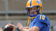Sep 27, 2025; Pittsburgh, Pennsylvania, USA;  Pittsburgh Panthers quarterback Eli Holstein (10) warms up before the game against the Louisville Cardinals at Acrisure Stadium. Mandatory Credit: Charles LeClaire-Imagn Images
