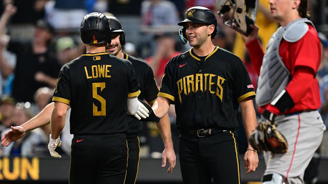 Aug 14, 2026; Pittsburgh, Pennsylvania, USA; Pittsburgh Pirates second baseman Brandon Lowe (5) is congratulated at home plate after hitting a three-run home run during the fifth inning against the Boston Red Sox at PNC Park. Mandatory Credit: David Dermer-Imagn Images
