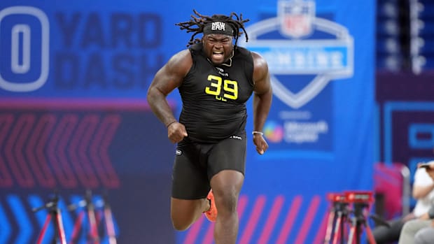 Indiana defensive lineman CJ West participates in drills during the 2025 NFL Combine at Lucas Oil Stadium.